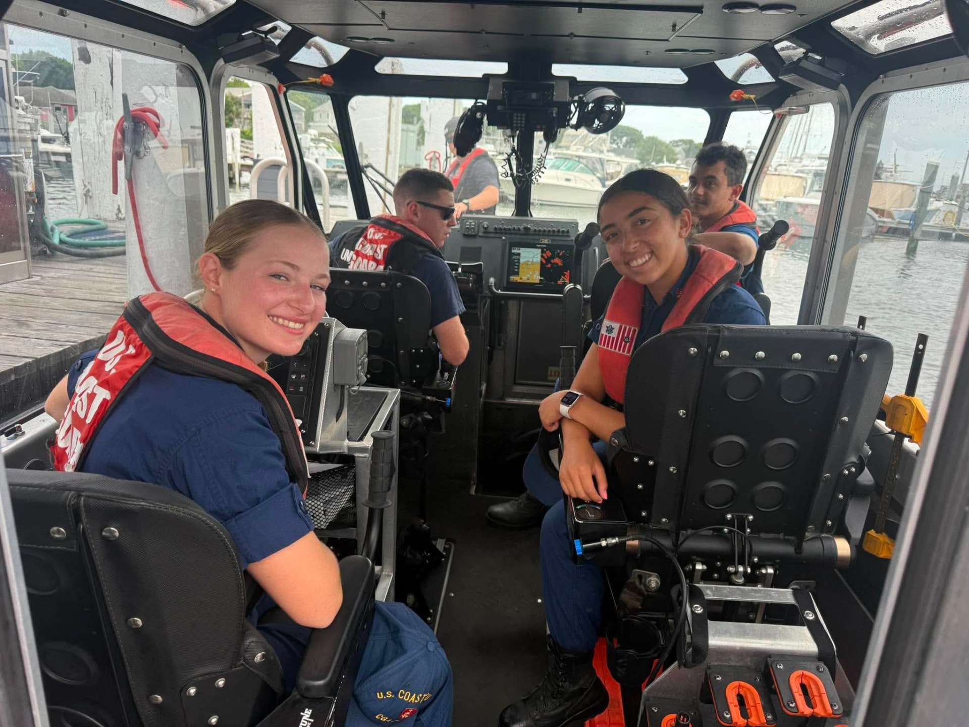 Bella Samaniego aboard a Coast Guard response boat during operational training at Station Woods Hole